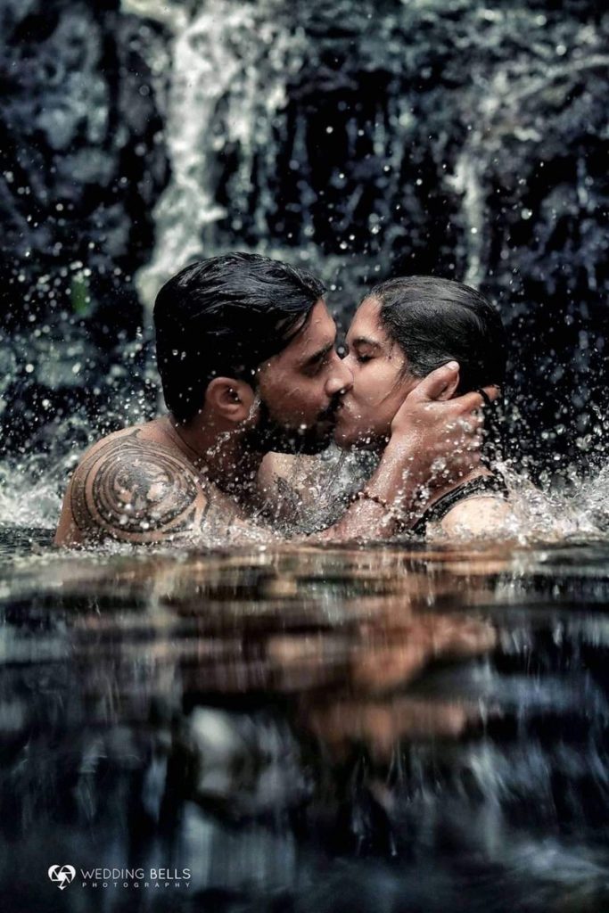 hot wedding photoshoots-romantic kiss snaps-bathing river falls photographer atrocities-photos-wedding-couples-images-sexy-pairs-stills